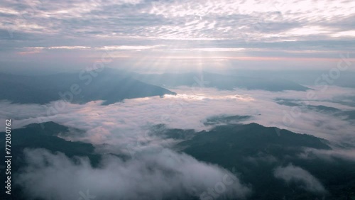 aerial view drone flying over sea of fog at sunrise