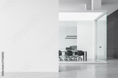 Industrial office interior with coworking and glass meeting room. Mockup wall