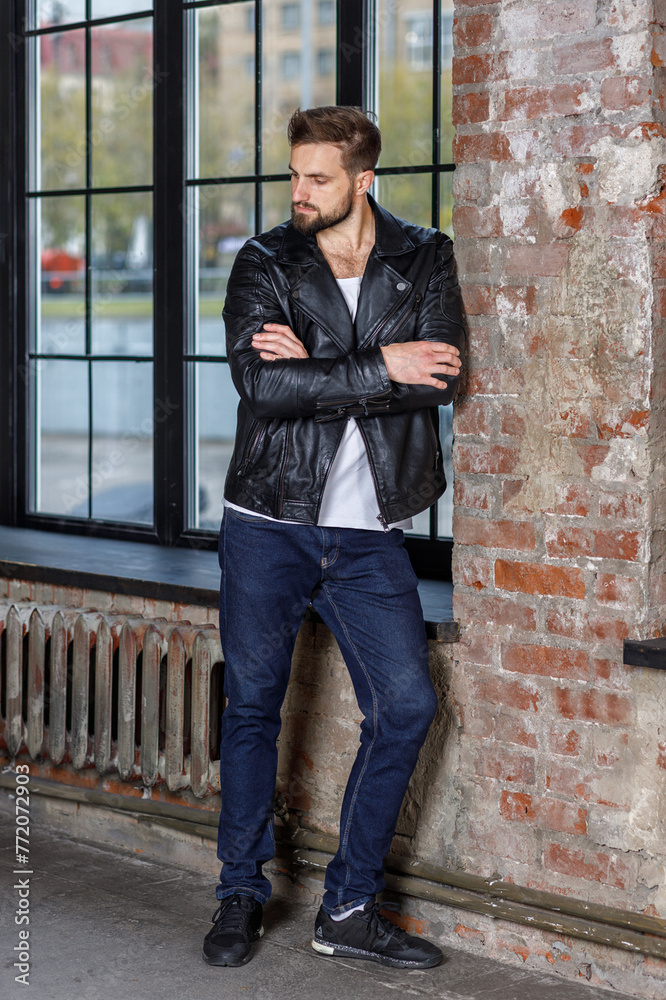 Ταπετσαρία Modern young man with a stylish hairstyle, wearing a cool black leather jacket a