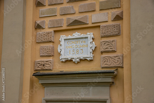 CNDITVM ANNO DOMENI 1583, plaque on the facade of an old castle photo