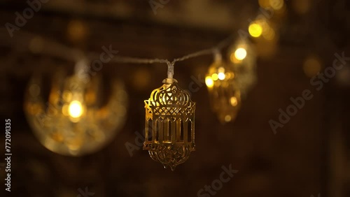 Home decor in the month of Ramadan. Decorative Muslim cozy lanterns, Festive warm lights photo