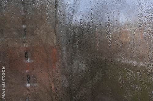 water drops on the wet glass of the window. background