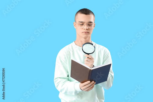 Young man with book and mag...