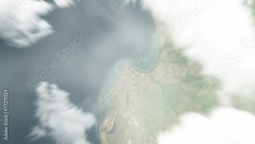 Earth zoom in from space to Cabinda, Angola. Followed by zoom out through clouds and atmosphere into space. Satellite view. Travel intro. Images from NASA photo