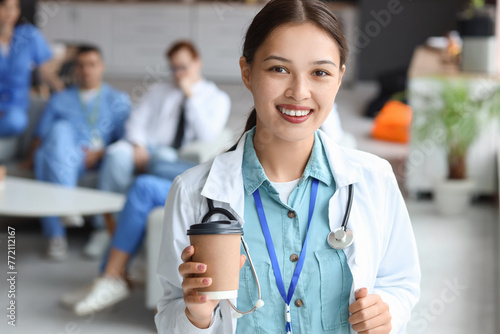 Female Asian doctor with co...