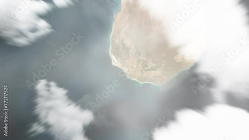 Earth zoom in from space to Vila do Maio, Cabo Verde. Followed by zoom out through clouds and atmosphere into space. Satellite view. Travel intro. Images from NASA