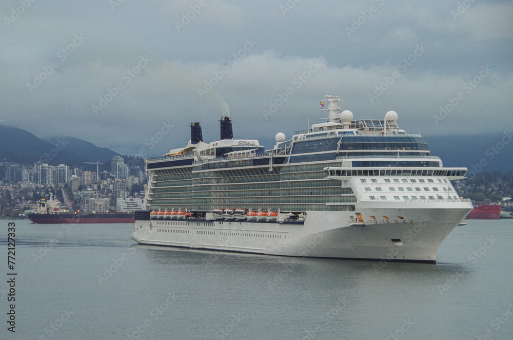 Modern cruiseship or cruise ship liner Eclipse arrival into Vancouver cruise port in Canada for Alaska cruising on family vacation