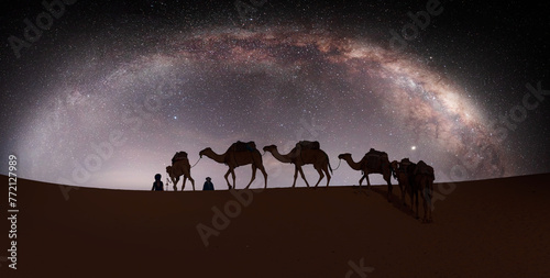Valokuva Camel caravan in the desert with milky way galaxy -  Sahara, Morrocco