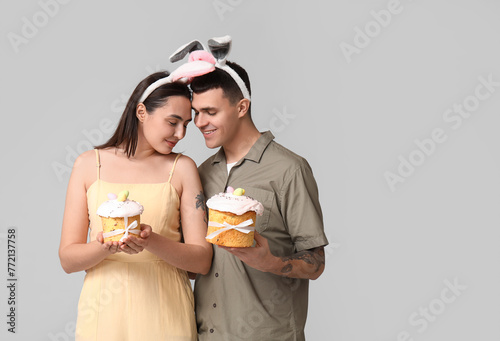 Happy young couple with Eas...
