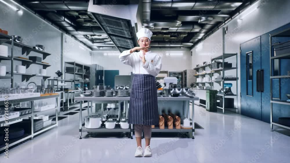 Full Body Of Asian Woman Chef Looking At Camera And Showing Time Out Hands Gesture In Professional Kitchen Full Body Of Asian Woman Chef Looking At Camera And Showing Time Out Hands Gesture In Professional Kitchen