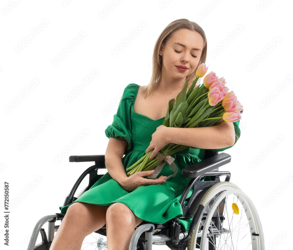 Young woman in wheelchair with tulips on white background. International Women's Day Young woman in wheelchair with tulips on white background. International Women's Day