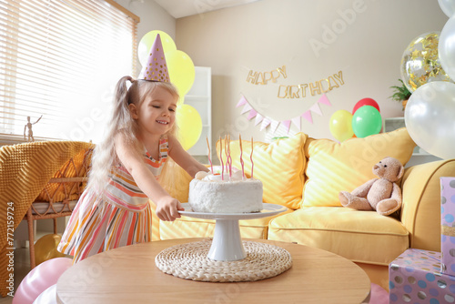 Cute little girl in party h...