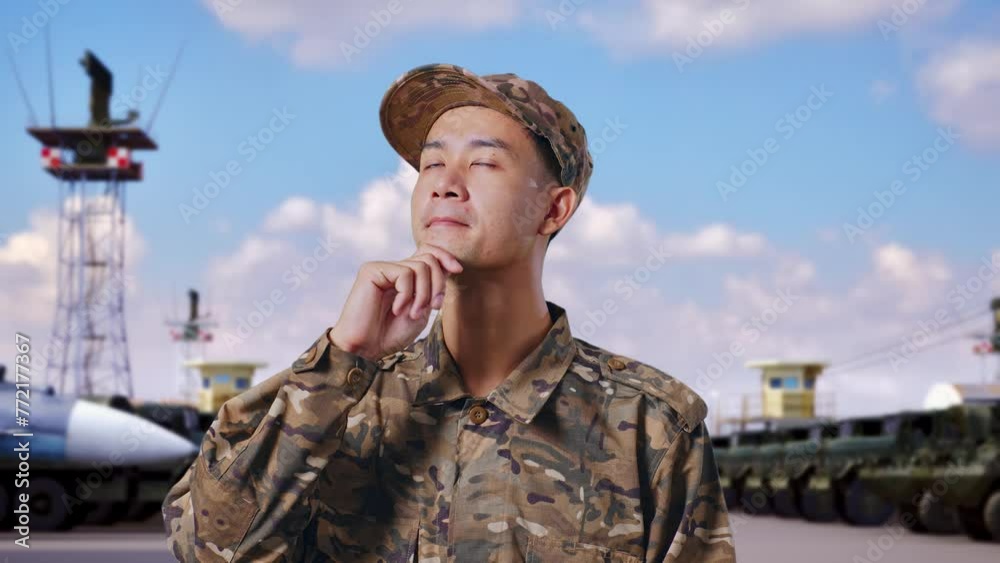 Close Up Of Asian Man Soldier Thinking About Something And Looking Around While Standing At Military Camp Close Up Of Asian Man Soldier Thinking About Something And Looking Around While Standing At Military Camp