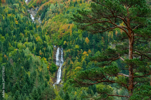Autumn forest and waterfall at Bujaruelo Valley, Ordesa  Monte Perdido National Park, Huesca, Aragon, Spain - stock photo photo