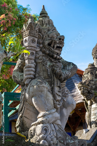 Ancient sculptures in the city of Ubud on the island of Bali, Indonesia. © ArturSniezhyn