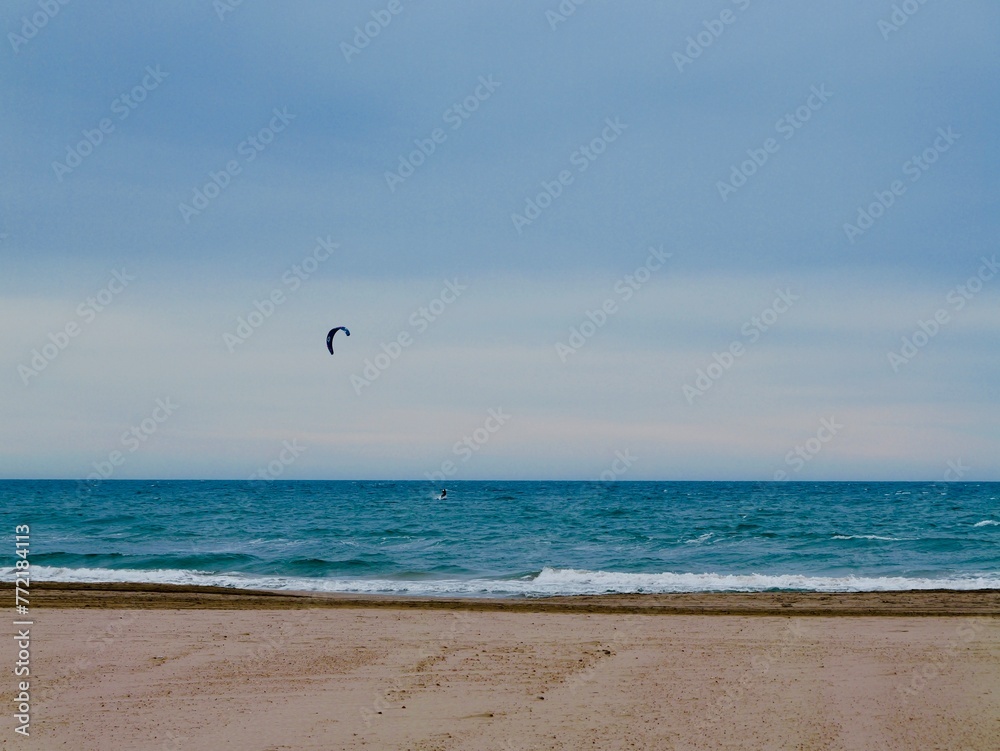 Kiteboarding or kitesurfing in Mediterranian cost of Spain, El Grao de Castellon, Valencia, Spain Kiteboarding or kitesurfing in Mediterranian cost of Spain, El Grao de Castellon, Valencia, Spain