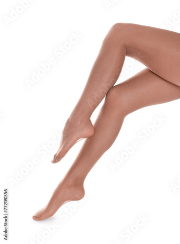Woman with beautiful long legs wearing tights on white background, closeup