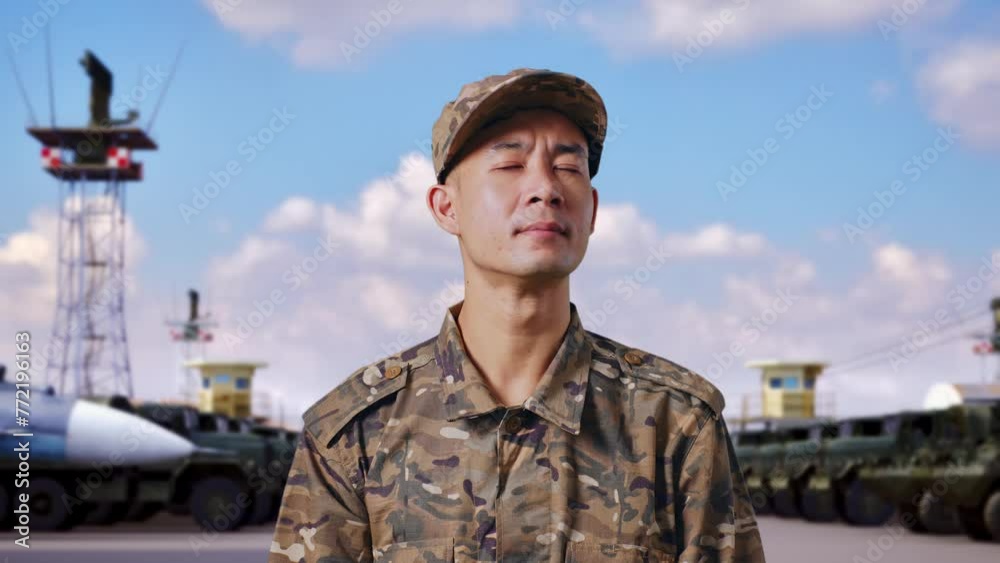 Close Up Of Asian Man Soldier Looking Around While Standing At Military Camp Close Up Of Asian Man Soldier Looking Around While Standing At Military Camp