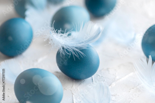 Blue easter eggs on light background