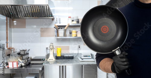 Restaurant kitchen. Frying ...