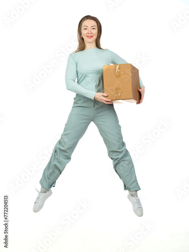 Woman with box jumps. Girl ...