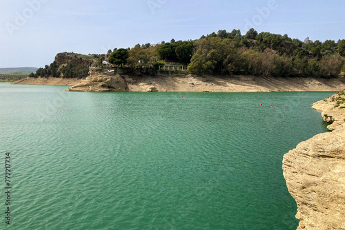 Lake Embalse conde de Guadalhorce on sunny day in El Chorro, Malaga, Spain
