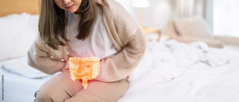 Woman sick unhappy holding belly stomach with suffering from stomach ache pain, monthly period, gastritis, gastroenteritis, food poisoning, diarrhea, intestinal inflammation, Woman healthcare