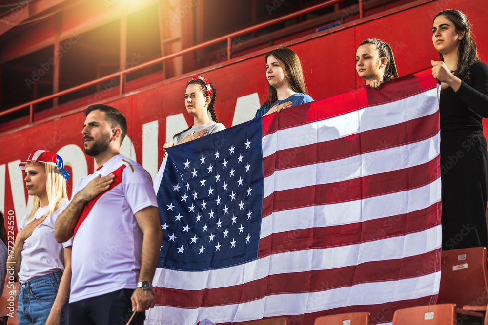 American football / soccer fans singing anthem at the stadium - obrazy, fototapety, plakaty 