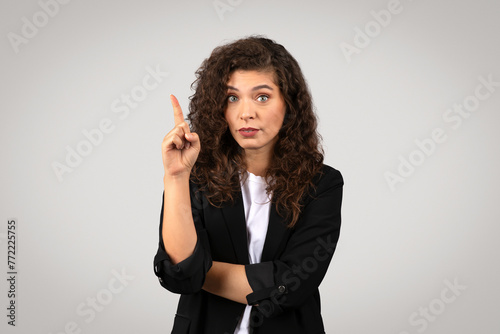 Fotografie Woman with a warning finger raised