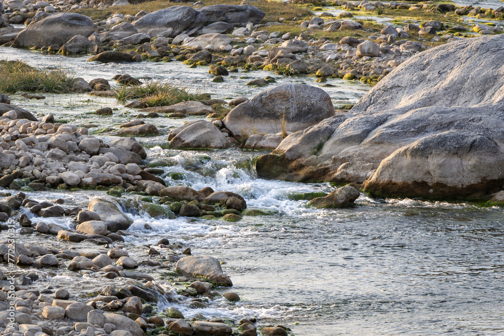 mountain river water flowing at evening from flat angle mountain river water flowing at evening from flat angle