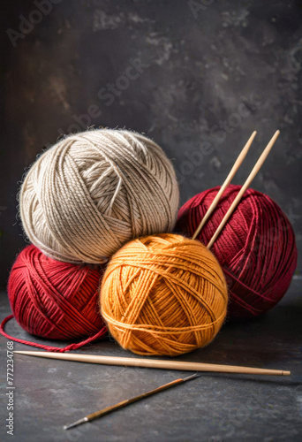 Lots of skeins of soft yarn on a simple background, world knitting day