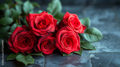 red roses on black wooden table, valentine's day background