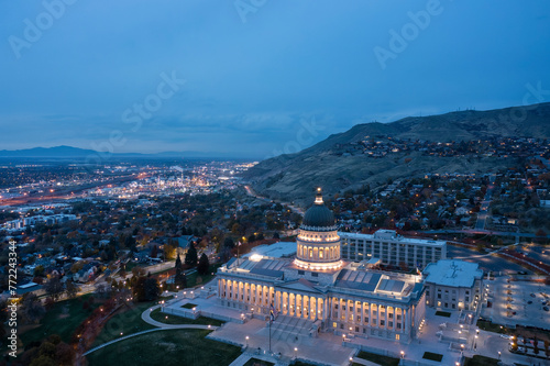 Utah State Capitol seen from above, night image with city in the background, Salt lake City, UT, US photo