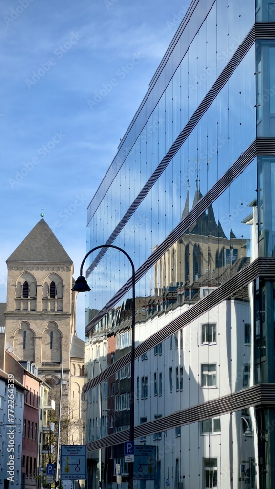 old church reflected in building, cologne, köln, nre, germany