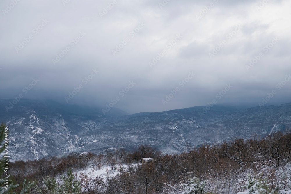 Cloudy sky over the snowy Rhodope Mountains, Bulgaria.