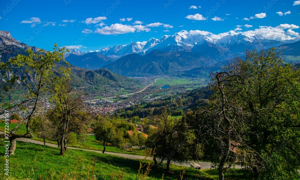 Scenic landscape of a small town surrounded by majestic Alps. France.