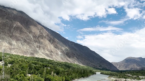 landscape in the mountains Cloud Blue Sky Mountain Peak Tree Green Grass Road River Lake Canal