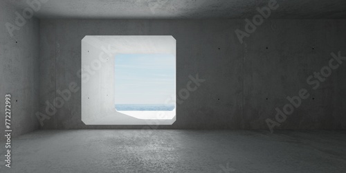 Abstract empty, modern concrete room with large square opening in the back wall and ocean view - industrial interior background template © Shawn Hempel