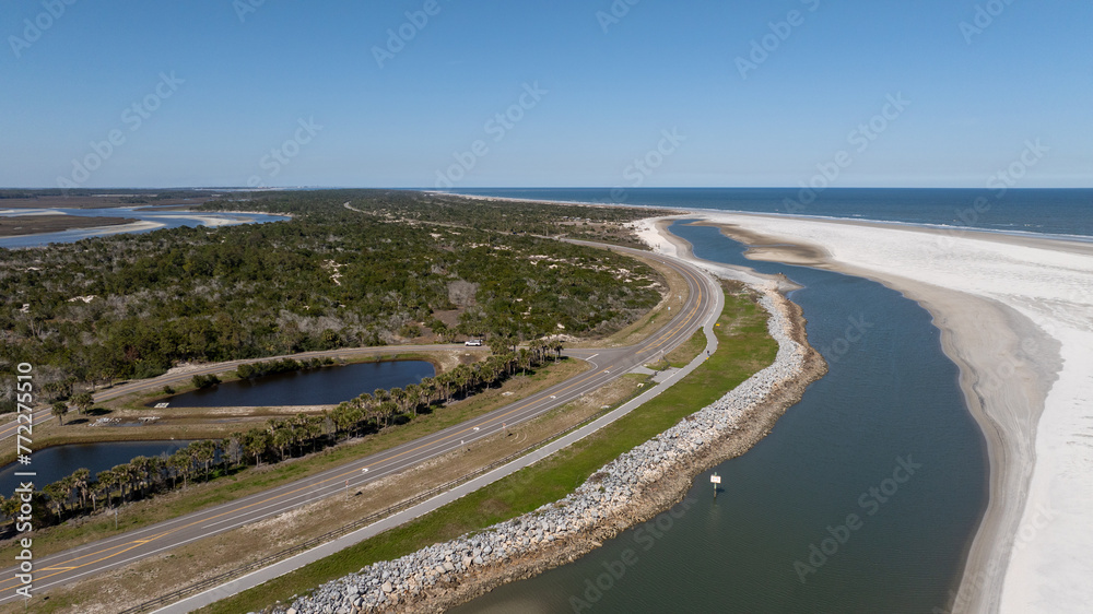 Aerial shot of Highway A1A running through Jacksonville, flanked by the glistening Fort George River and Heckscher Drive.