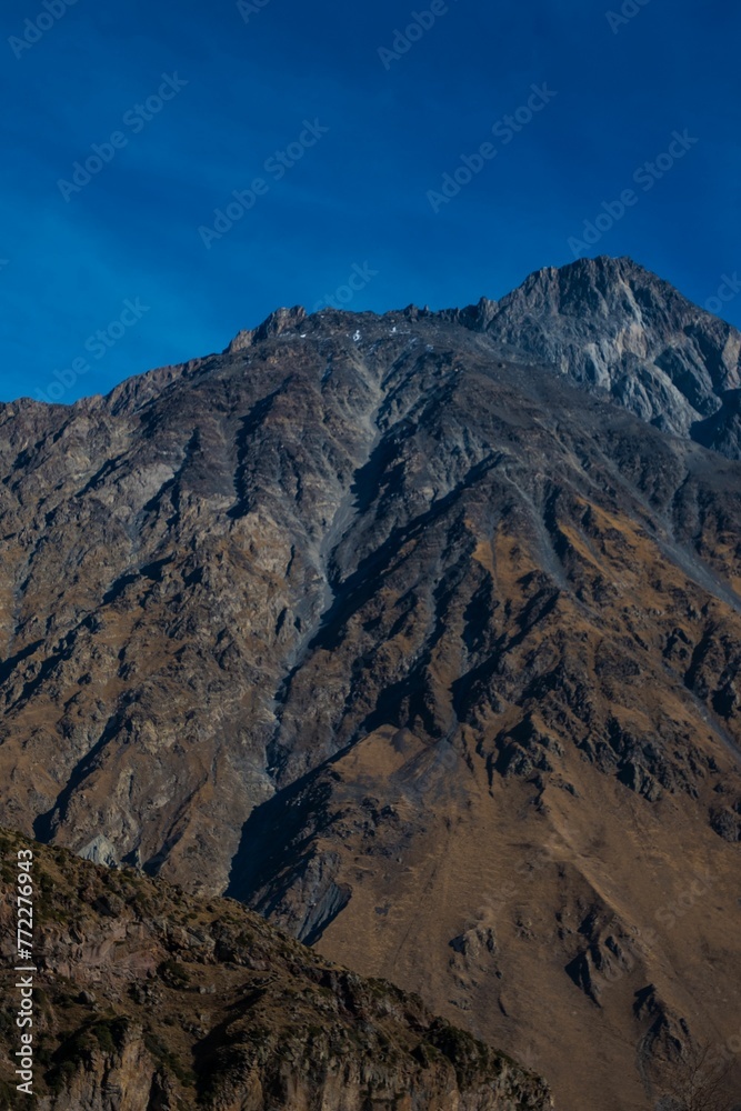 Stepantsminda, Georgia, captures the stunning Kazbegi Mountain region of Mtskheta-Mtianeti