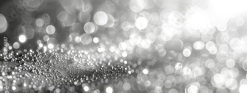 Abstract white bokeh lights with soft light background,