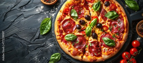 A top view of a mouth-watering pizza topped with pepperoni and olives, placed on a wooden table.