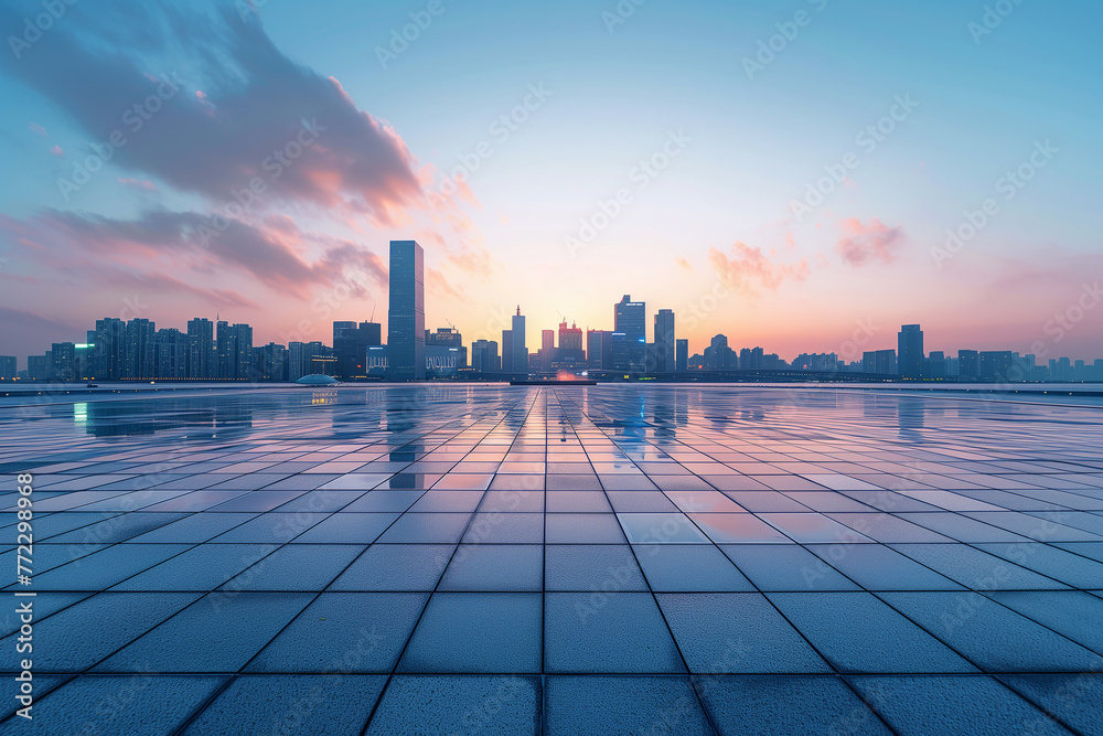 City skyline at sunrise with reflective floor City skyline at sunrise with reflective floor