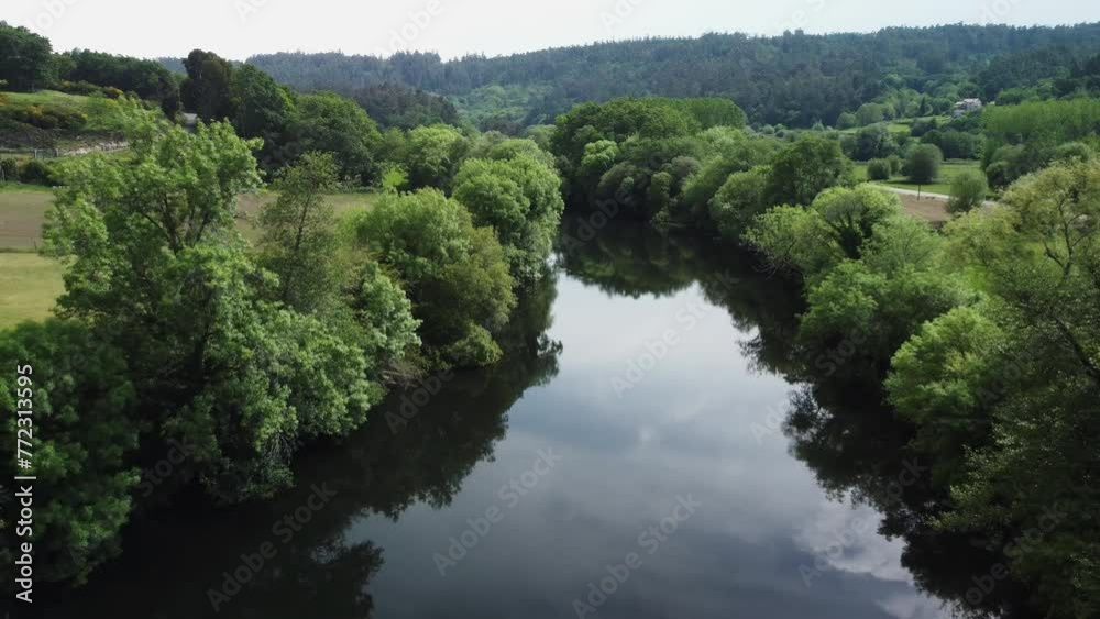 Drone view over waterfall river and traditional pazo house with gardens, trees Ponte Maceira, Spain Drone view over waterfall river and traditional pazo house with gardens, trees Ponte Maceira, Spain