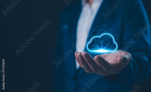 A professional interacts with a futuristic cloud computing interface, connectivity and data management in the digital age. Highlighting innovation and technology. Data transformation concept.