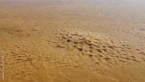 Closeup of a beautiful landscape of a desert on a sunny  hot day in Saudi Arabia