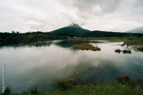 lake in Bahia Lapataia amidst mountains at Tierra del Fuego