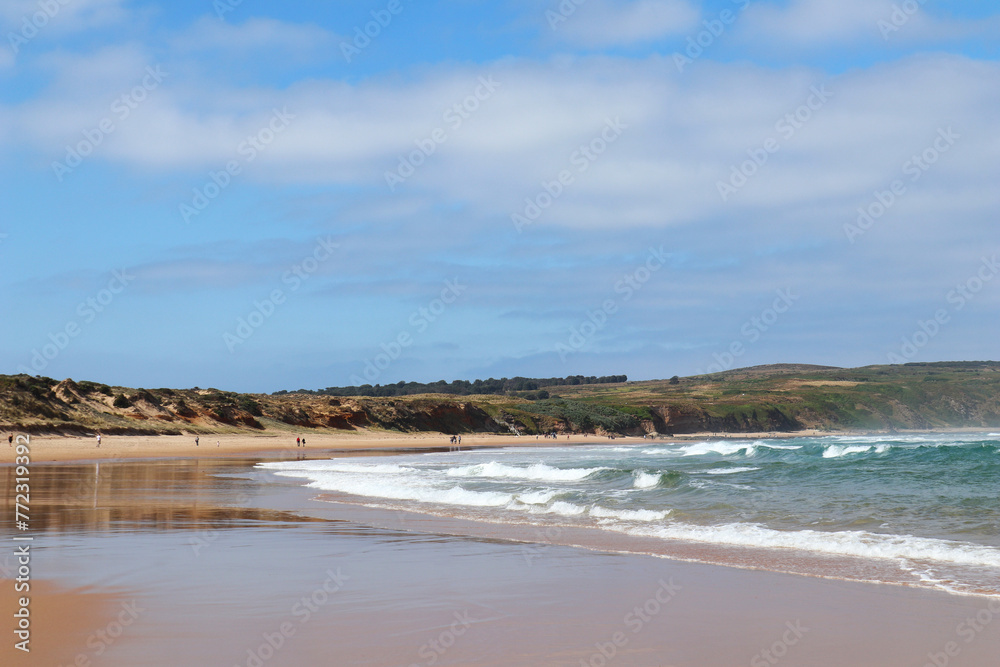 people on the shore of the open ocean people on the shore of the open ocean