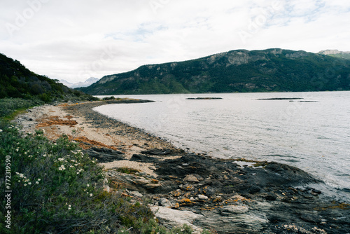 lake in Bahia Lapataia amidst mountains at Tierra del Fuego photo