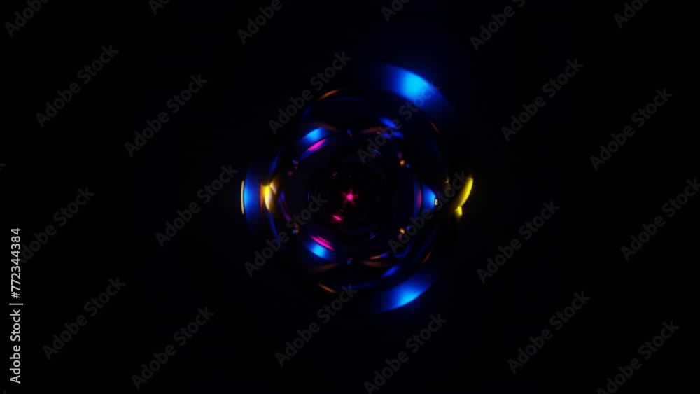 Neon lights twirl rhythmically in an abstract VJ Loop display. Neon lights twirl rhythmically in an abstract VJ Loop display.
